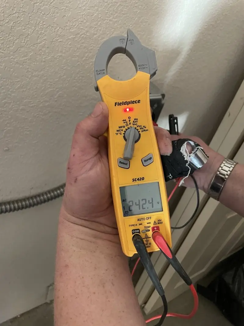 Voltage testing with clamp meter during Generator Installation in Palm Desert